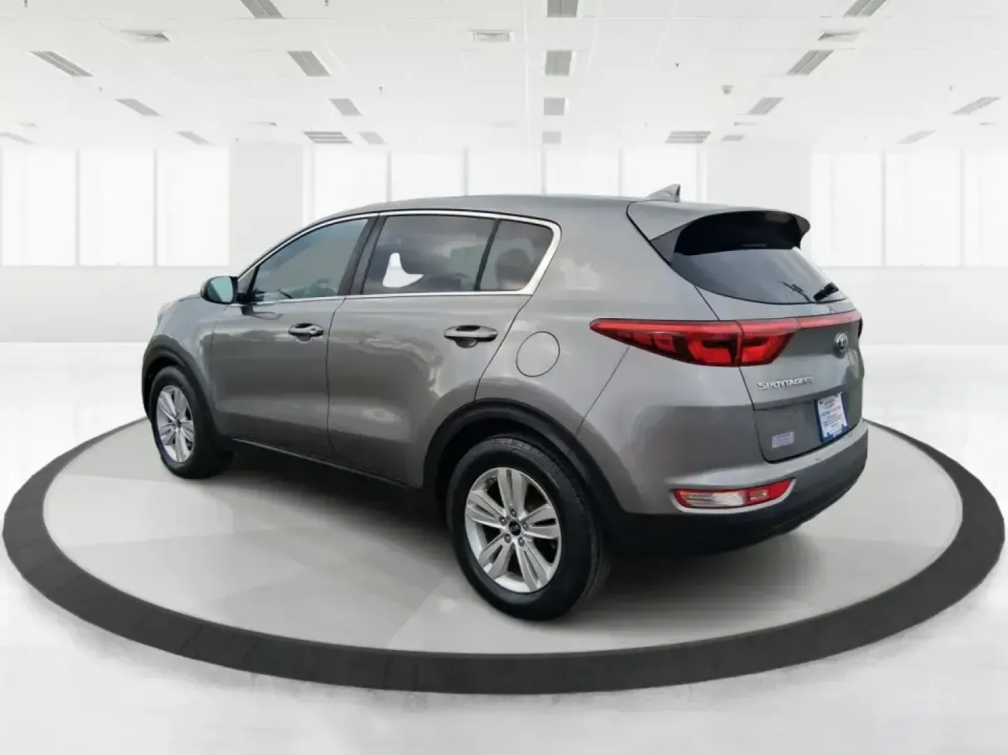 2018 Kia Sportage LX (KNDPM3AC0J7) with an Theta II 2.4L I-4 gasoline direct injection engine, 6A transmission, located at 1099 N County Rd 25A , Troy, OH, 45373, (937) 908-9800, 40.057079, -84.212883 - Weekend road trips to the Miami County Fair, daily commutes down I75, or quick errands between Downtown Troy and the shops near West Main Street-this 2018 Kia Sportage LX is the kind of compact SUV that fits real life. With its versatile crossover layout, confident road manners, and smart cargo spac - Photo#4