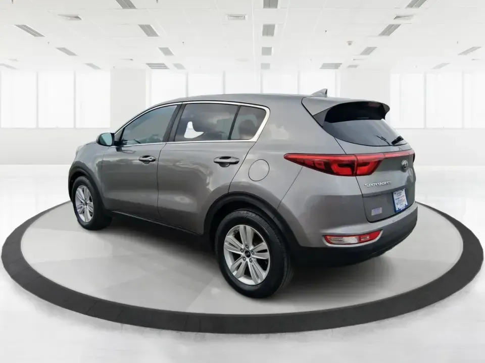 2018 Kia Sportage LX (KNDPM3AC0J7) with an Theta II 2.4L I-4 gasoline direct injection engine, 6A transmission, located at 1099 N County Rd 25A , Troy, OH, 45373, (937) 908-9800, 40.057079, -84.212883 - Weekend road trips to the Miami County Fair, daily commutes down I75, or quick errands between Downtown Troy and the shops near West Main Street-this 2018 Kia Sportage LX is the kind of compact SUV that fits real life. With its versatile crossover layout, confident road manners, and smart cargo spac - Photo#4