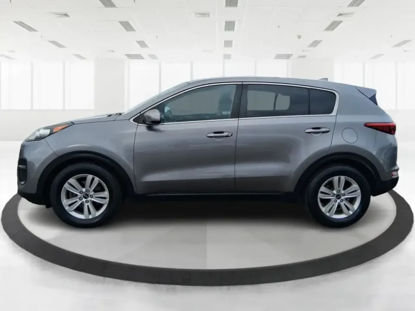 2018 Kia Sportage LX (KNDPM3AC0J7) with an Theta II 2.4L I-4 gasoline direct injection engine, 6A transmission, located at 1099 N County Rd 25A , Troy, OH, 45373, (937) 908-9800, 40.057079, -84.212883 - Weekend road trips to the Miami County Fair, daily commutes down I75, or quick errands between Downtown Troy and the shops near West Main Street-this 2018 Kia Sportage LX is the kind of compact SUV that fits real life. With its versatile crossover layout, confident road manners, and smart cargo spac - Photo#5