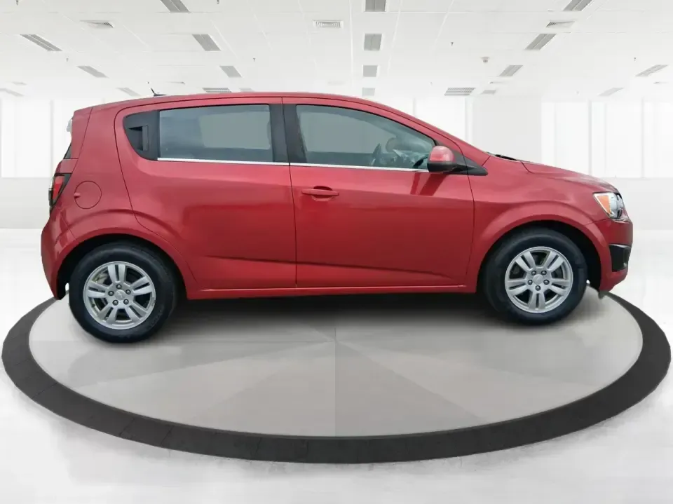 2014 Chevrolet Sonic LT Auto (1G1JC6SH7E4) with an 1.8L L4 DOHC 24V engine, 6-Speed Automatic transmission, located at 1099 N County Rd 25A , Troy, OH, 45373, (937) 908-9800, 40.057079, -84.212883 - Need a smart, easy-to-park commuter that still has room for grocery runs, school backpacks, and weekend getaways to Dayton or the Miami Valley? This 2014 Chevrolet Sonic LT Auto Hatchback delivers the kind of real-world versatility that fits everyday life in Troy-zippy around town, efficient for lon - Photo#1