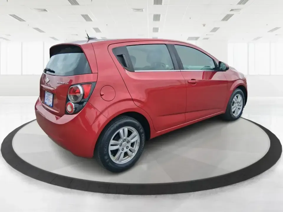 2014 Chevrolet Sonic LT Auto (1G1JC6SH7E4) with an 1.8L L4 DOHC 24V engine, 6-Speed Automatic transmission, located at 1099 N County Rd 25A , Troy, OH, 45373, (937) 908-9800, 40.057079, -84.212883 - Need a smart, easy-to-park commuter that still has room for grocery runs, school backpacks, and weekend getaways to Dayton or the Miami Valley? This 2014 Chevrolet Sonic LT Auto Hatchback delivers the kind of real-world versatility that fits everyday life in Troy-zippy around town, efficient for lon - Photo#2