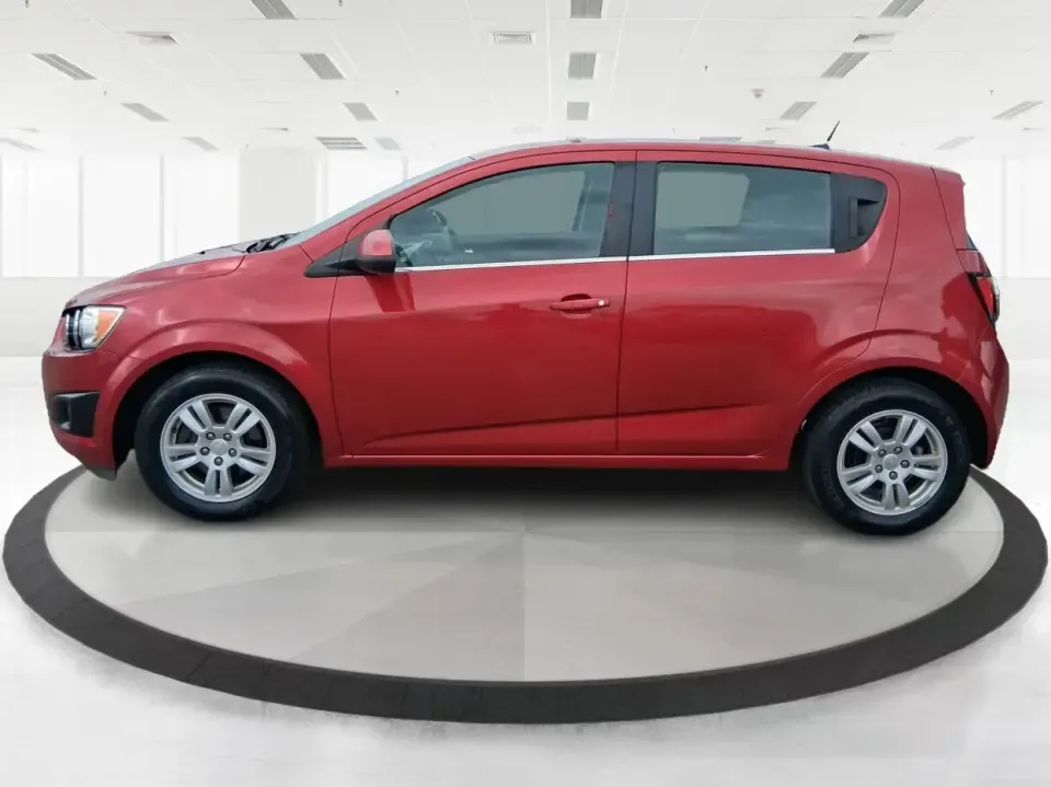 2014 Chevrolet Sonic LT Auto (1G1JC6SH7E4) with an 1.8L L4 DOHC 24V engine, 6-Speed Automatic transmission, located at 1099 N County Rd 25A , Troy, OH, 45373, (937) 908-9800, 40.057079, -84.212883 - Need a smart, easy-to-park commuter that still has room for grocery runs, school backpacks, and weekend getaways to Dayton or the Miami Valley? This 2014 Chevrolet Sonic LT Auto Hatchback delivers the kind of real-world versatility that fits everyday life in Troy-zippy around town, efficient for lon - Photo#5