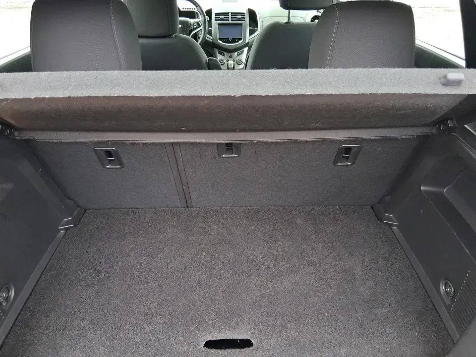 2014 Chevrolet Sonic LT Auto (1G1JC6SH7E4) with an 1.8L L4 DOHC 24V engine, 6-Speed Automatic transmission, located at 1099 N County Rd 25A , Troy, OH, 45373, (937) 908-9800, 40.057079, -84.212883 - Need a smart, easy-to-park commuter that still has room for grocery runs, school backpacks, and weekend getaways to Dayton or the Miami Valley? This 2014 Chevrolet Sonic LT Auto Hatchback delivers the kind of real-world versatility that fits everyday life in Troy-zippy around town, efficient for lon - Photo#12