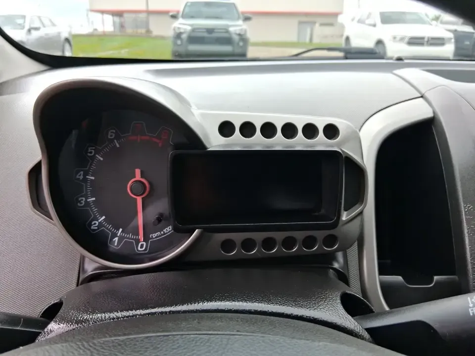 2014 Chevrolet Sonic LT Auto (1G1JC6SH7E4) with an 1.8L L4 DOHC 24V engine, 6-Speed Automatic transmission, located at 1099 N County Rd 25A , Troy, OH, 45373, (937) 908-9800, 40.057079, -84.212883 - Need a smart, easy-to-park commuter that still has room for grocery runs, school backpacks, and weekend getaways to Dayton or the Miami Valley? This 2014 Chevrolet Sonic LT Auto Hatchback delivers the kind of real-world versatility that fits everyday life in Troy-zippy around town, efficient for lon - Photo#15