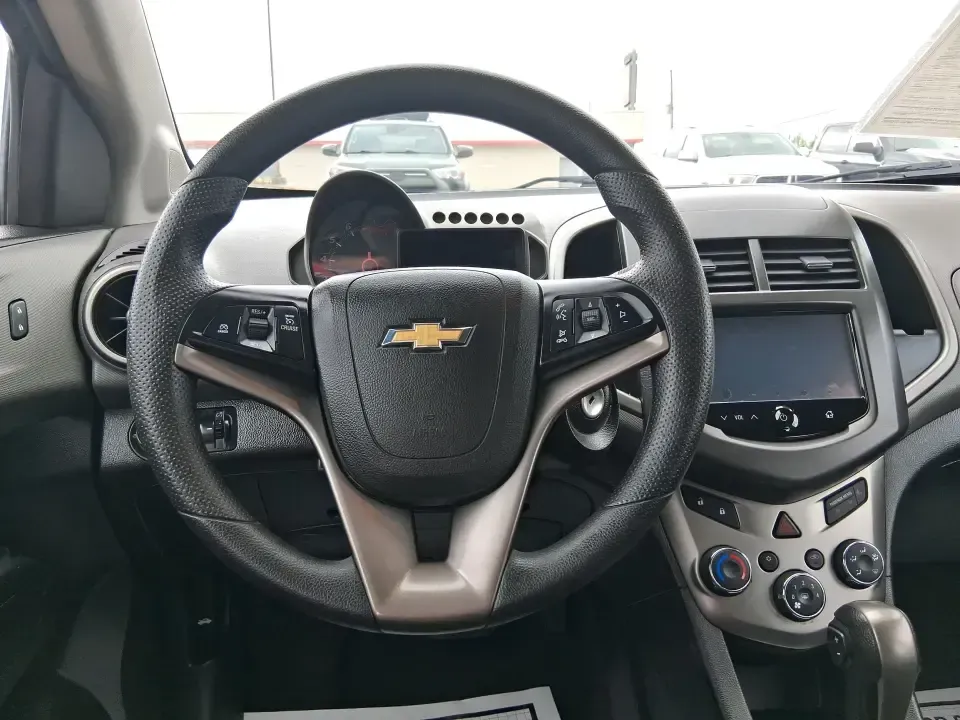 2014 Chevrolet Sonic LT Auto (1G1JC6SH7E4) with an 1.8L L4 DOHC 24V engine, 6-Speed Automatic transmission, located at 1099 N County Rd 25A , Troy, OH, 45373, (937) 908-9800, 40.057079, -84.212883 - Need a smart, easy-to-park commuter that still has room for grocery runs, school backpacks, and weekend getaways to Dayton or the Miami Valley? This 2014 Chevrolet Sonic LT Auto Hatchback delivers the kind of real-world versatility that fits everyday life in Troy-zippy around town, efficient for lon - Photo#16