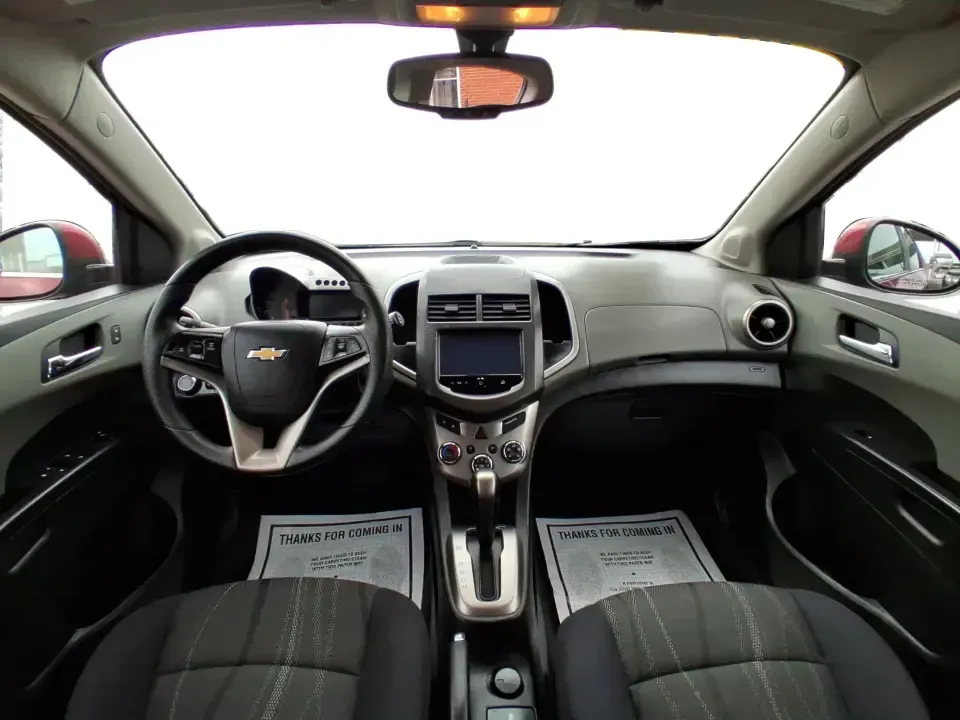 2014 Chevrolet Sonic LT Auto (1G1JC6SH7E4) with an 1.8L L4 DOHC 24V engine, 6-Speed Automatic transmission, located at 1230 East Main St, Xenia, OH, 45385, (937) 908-9800, 39.688026, -83.910172 - Need a smart, easy-to-park commuter that still has room for grocery runs, school backpacks, and weekend getaways to Dayton or the Miami Valley? This 2014 Chevrolet Sonic LT Auto Hatchback delivers the kind of real-world versatility that fits everyday life in Troy-zippy around town, efficient for lon - Photo#20