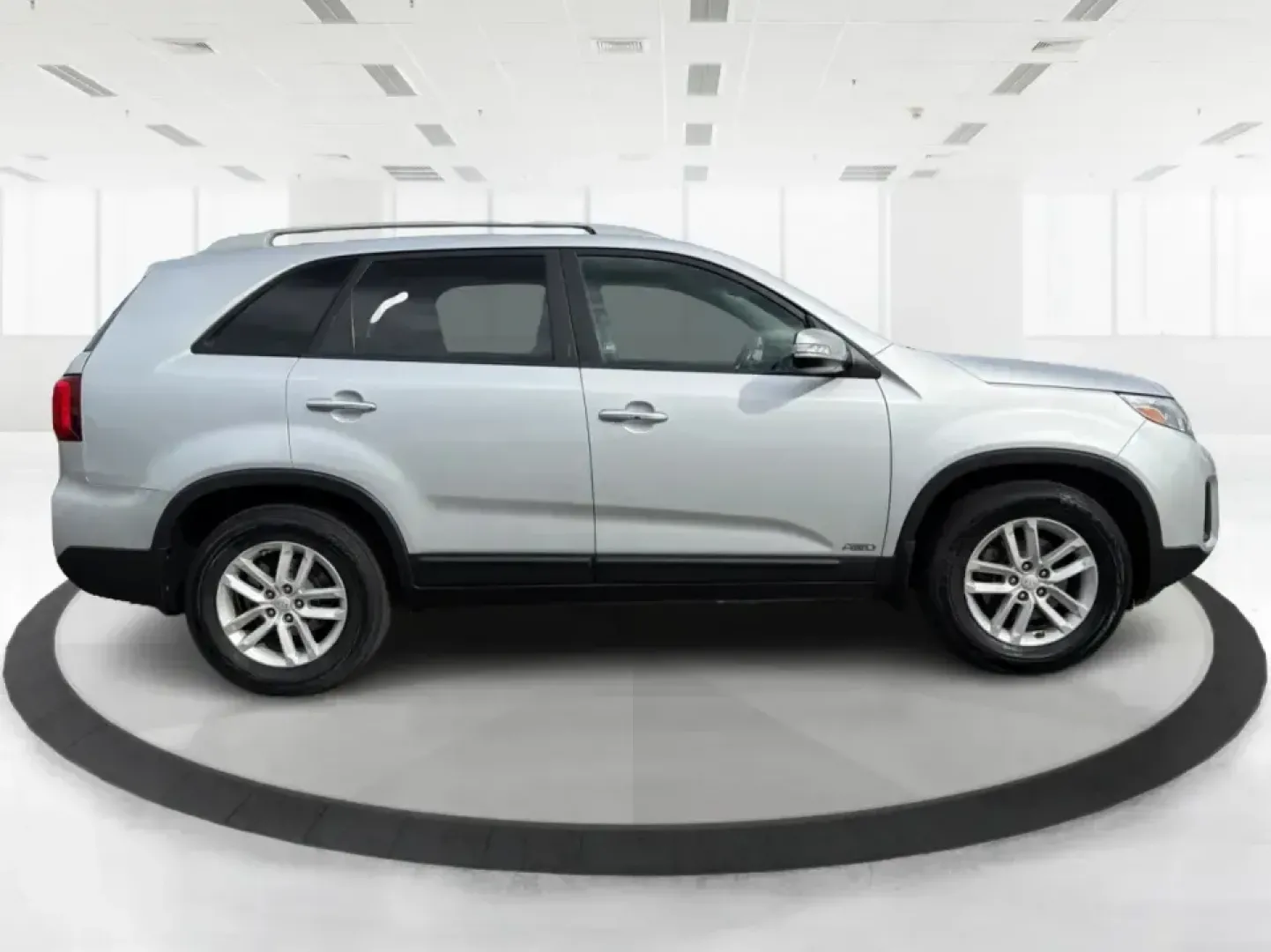 2014 Kia Sorento LX V6 (5XYKTDA74EG) with an Lambda II 3.3L V-6 gasoline direct injection engine, 6-Speed Automatic transmission, located at 8750 N County Rd 25A, Piqua, OH, 45356, (937) 908-9800, 40.164391, -84.232513 - Picture your next Ohio weekend: the kids loaded up for a day at Johnston Farm and Indian Agency, groceries stowed for the week, and enough power on tap to handle I75 merges without breaking a sweat. This 2014 Kia Sorento LX V6 in Bright Silver is the kind of do-it-all SUV that fits real life in Pi - Photo#1