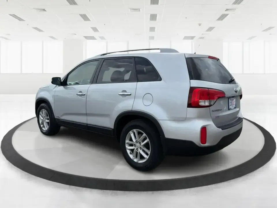 2014 Kia Sorento LX V6 (5XYKTDA74EG) with an Lambda II 3.3L V-6 gasoline direct injection engine, 6-Speed Automatic transmission, located at 8750 N County Rd 25A, Piqua, OH, 45356, (937) 908-9800, 40.164391, -84.232513 - Picture your next Ohio weekend: the kids loaded up for a day at Johnston Farm and Indian Agency, groceries stowed for the week, and enough power on tap to handle I75 merges without breaking a sweat. This 2014 Kia Sorento LX V6 in Bright Silver is the kind of do-it-all SUV that fits real life in Pi - Photo#4