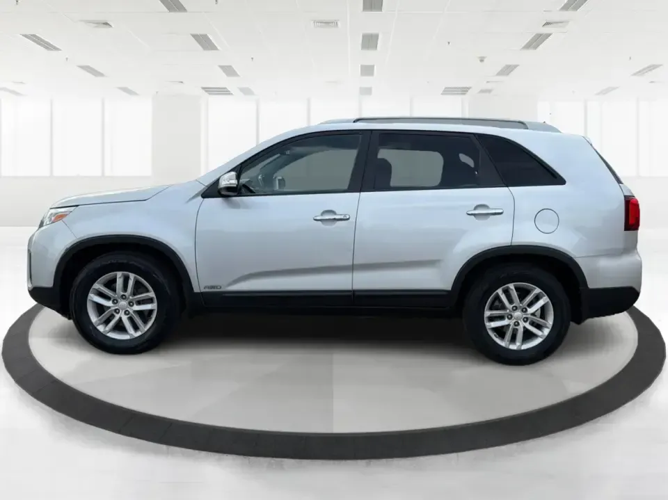 2014 Kia Sorento LX V6 (5XYKTDA74EG) with an Lambda II 3.3L V-6 gasoline direct injection engine, 6-Speed Automatic transmission, located at 8750 N County Rd 25A, Piqua, OH, 45356, (937) 908-9800, 40.164391, -84.232513 - Picture your next Ohio weekend: the kids loaded up for a day at Johnston Farm and Indian Agency, groceries stowed for the week, and enough power on tap to handle I75 merges without breaking a sweat. This 2014 Kia Sorento LX V6 in Bright Silver is the kind of do-it-all SUV that fits real life in Pi - Photo#5