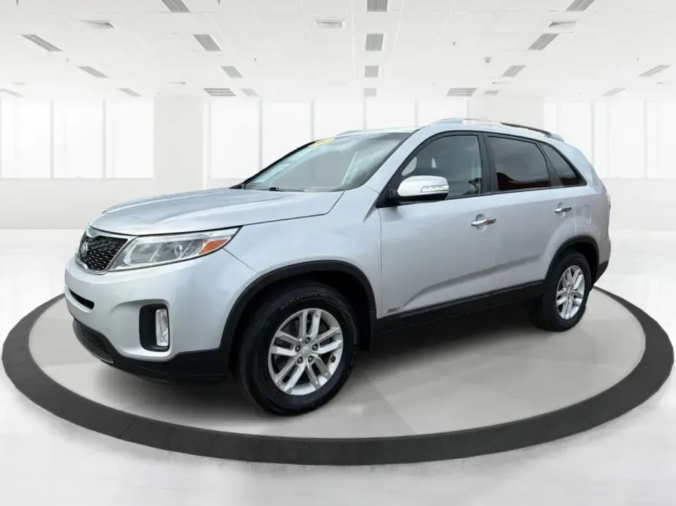 2014 Kia Sorento LX V6 (5XYKTDA74EG) with an Lambda II 3.3L V-6 gasoline direct injection engine, 6-Speed Automatic transmission, located at 8750 N County Rd 25A, Piqua, OH, 45356, (937) 908-9800, 40.164391, -84.232513 - Picture your next Ohio weekend: the kids loaded up for a day at Johnston Farm and Indian Agency, groceries stowed for the week, and enough power on tap to handle I75 merges without breaking a sweat. This 2014 Kia Sorento LX V6 in Bright Silver is the kind of do-it-all SUV that fits real life in Pi - Photo#8