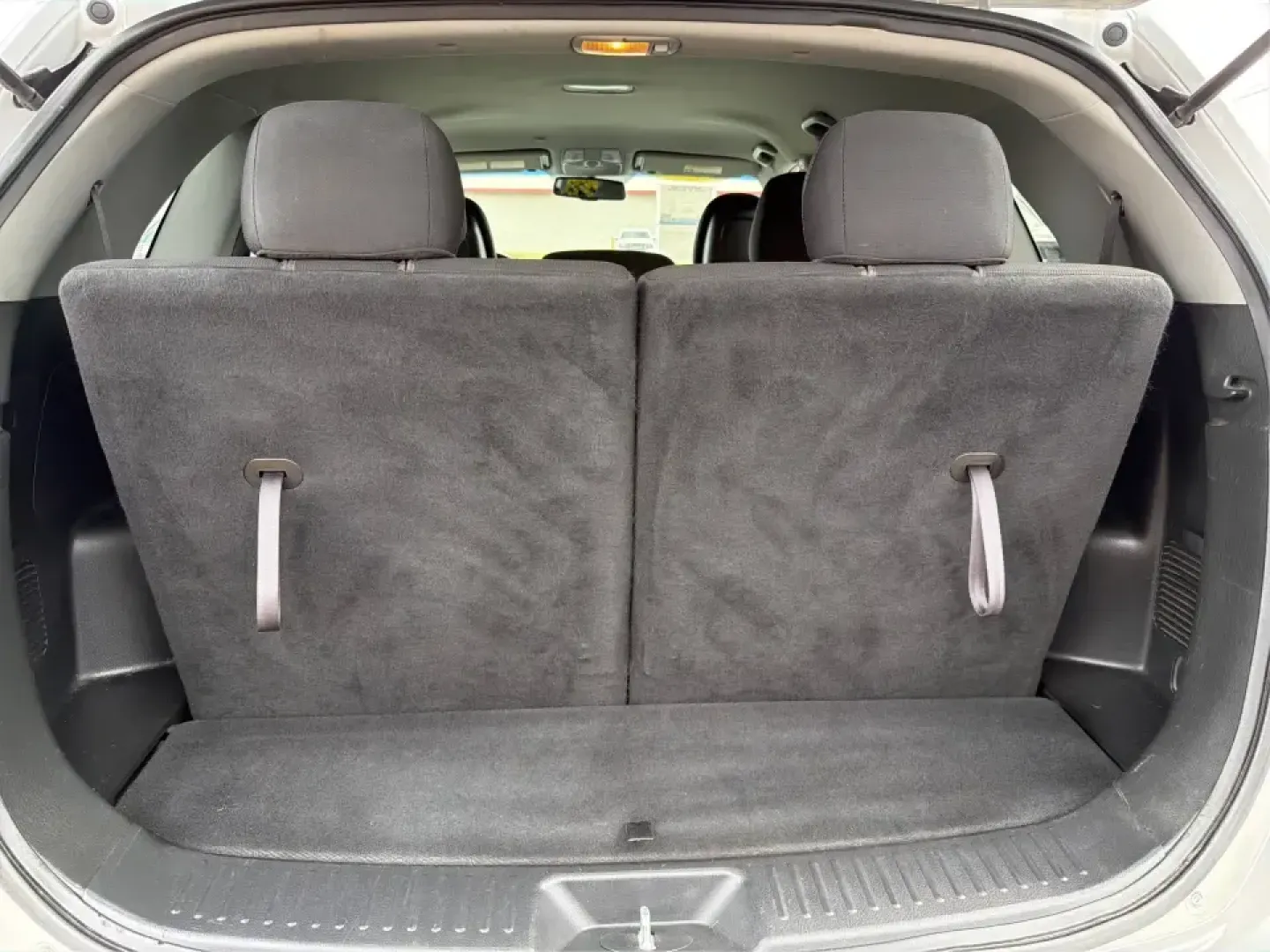 2014 Kia Sorento LX V6 (5XYKTDA74EG) with an Lambda II 3.3L V-6 gasoline direct injection engine, 6-Speed Automatic transmission, located at 8750 N County Rd 25A, Piqua, OH, 45356, (937) 908-9800, 40.164391, -84.232513 - Picture your next Ohio weekend: the kids loaded up for a day at Johnston Farm and Indian Agency, groceries stowed for the week, and enough power on tap to handle I75 merges without breaking a sweat. This 2014 Kia Sorento LX V6 in Bright Silver is the kind of do-it-all SUV that fits real life in Pi - Photo#12