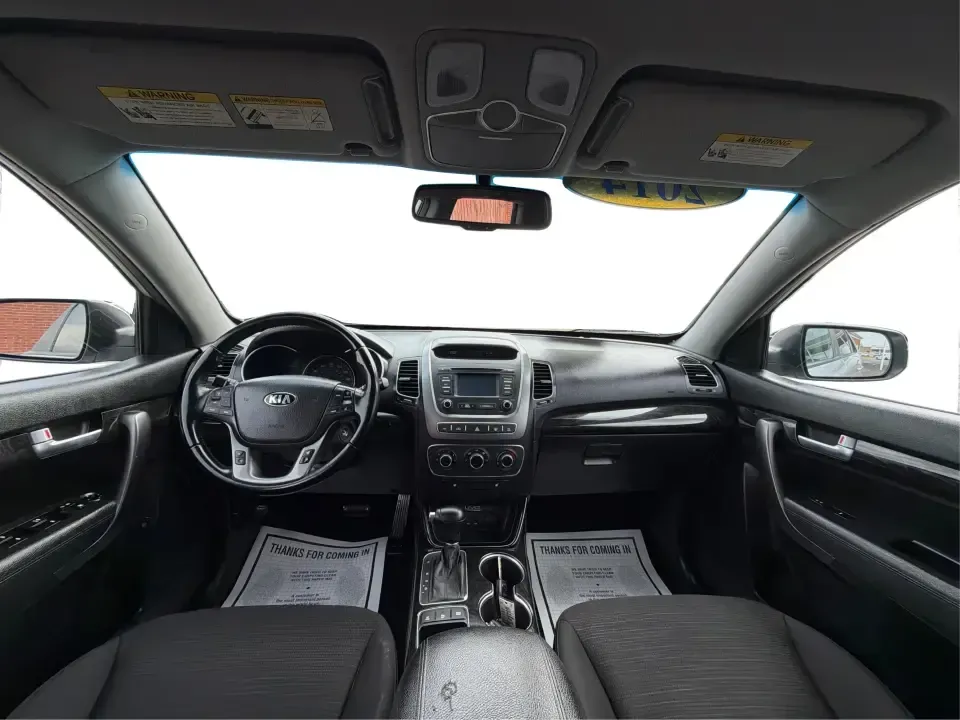 2014 Kia Sorento LX V6 (5XYKTDA74EG) with an Lambda II 3.3L V-6 gasoline direct injection engine, 6-Speed Automatic transmission, located at 8750 N County Rd 25A, Piqua, OH, 45356, (937) 908-9800, 40.164391, -84.232513 - Picture your next Ohio weekend: the kids loaded up for a day at Johnston Farm and Indian Agency, groceries stowed for the week, and enough power on tap to handle I75 merges without breaking a sweat. This 2014 Kia Sorento LX V6 in Bright Silver is the kind of do-it-all SUV that fits real life in Pi - Photo#21