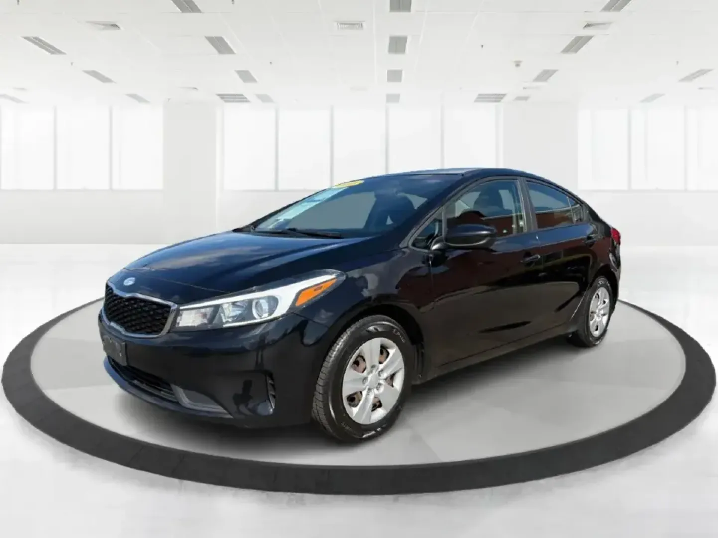 2018 Kia Forte LX (3KPFK4A79JE) with an 2L I-4 DOHC engine, 6M transmission, located at 880 E. National Road, Vandalia, OH, 45377, (937) 908-9800, 39.891918, -84.183594 - Need a dependable commuter that's easy to park downtown, comfortable for I-75 and SR-725 traffic, and still stylish enough for dinner in the Dayton area? This 2018 Kia Forte LX in Aurora Black is a smart, budget-friendly sedan that fits real life in Moraine, OH-whether you're stacking miles for work - Photo#8