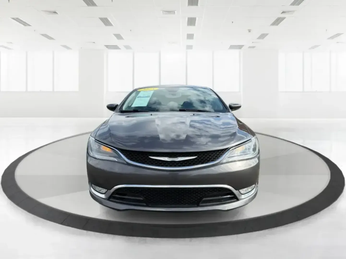 2015 Chrysler 200 C (1C3CCCCG7FN) with an 3.6L V6 DOHC 24V FFV engine, 9-Speed Automatic transmission, located at 880 E. National Road, Vandalia, OH, 45377, (937) 908-9800, 39.891918, -84.183594 - Set up for real life in the Miami Valley-school drop-offs, a long commute down I75, and comfortable weekend getaways-this 2015 Chrysler 200 C is the kind of midsize sedan that fits a busy schedule without feeling basic. With its smooth ride, strong V6 power, and upscale comfort features, it's a smar - Photo#7
