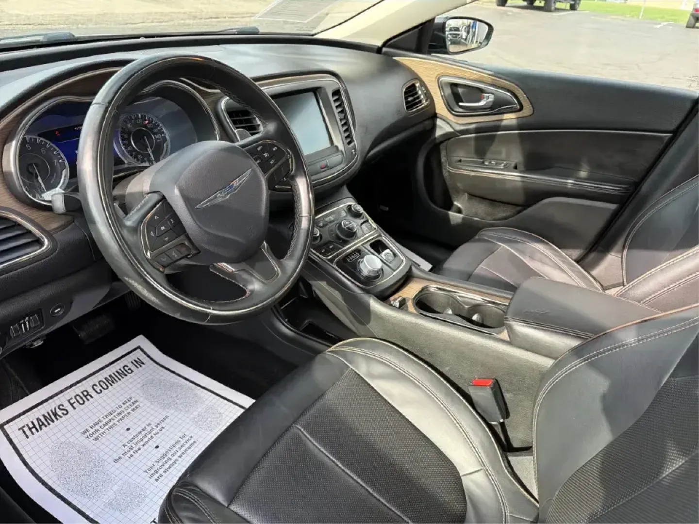 2015 Chrysler 200 C (1C3CCCCG7FN) with an 3.6L V6 DOHC 24V FFV engine, 9-Speed Automatic transmission, located at 880 E. National Road, Vandalia, OH, 45377, (937) 908-9800, 39.891918, -84.183594 - Set up for real life in the Miami Valley-school drop-offs, a long commute down I75, and comfortable weekend getaways-this 2015 Chrysler 200 C is the kind of midsize sedan that fits a busy schedule without feeling basic. With its smooth ride, strong V6 power, and upscale comfort features, it's a smar - Photo#9
