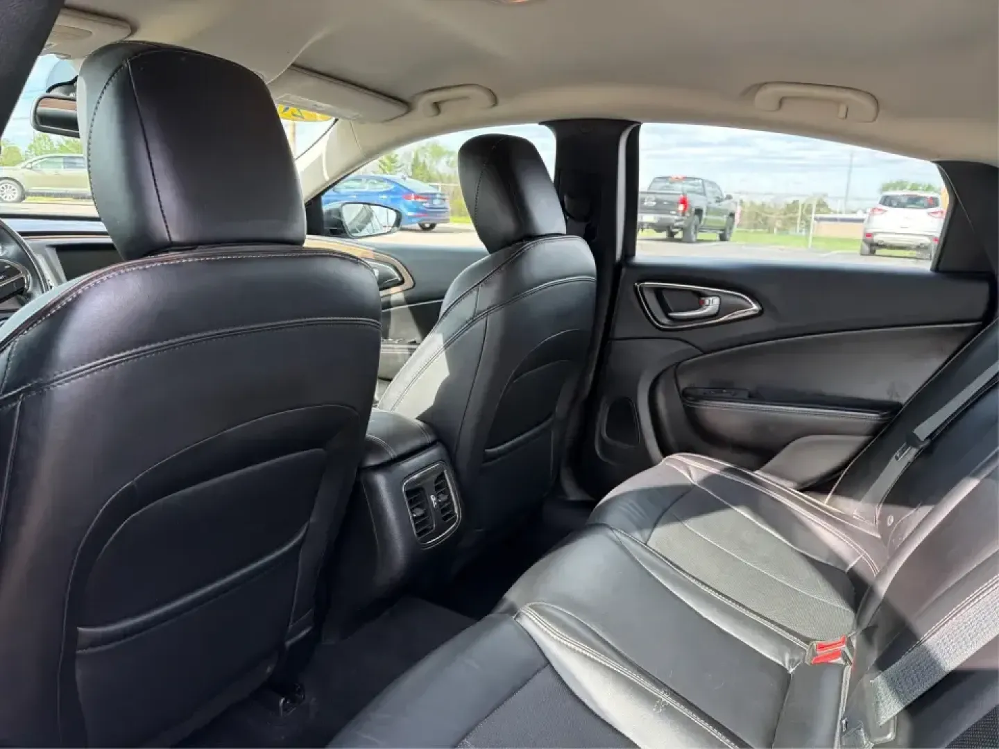 2015 Chrysler 200 C (1C3CCCCG7FN) with an 3.6L V6 DOHC 24V FFV engine, 9-Speed Automatic transmission, located at 880 E. National Road, Vandalia, OH, 45377, (937) 908-9800, 39.891918, -84.183594 - Set up for real life in the Miami Valley-school drop-offs, a long commute down I75, and comfortable weekend getaways-this 2015 Chrysler 200 C is the kind of midsize sedan that fits a busy schedule without feeling basic. With its smooth ride, strong V6 power, and upscale comfort features, it's a smar - Photo#10