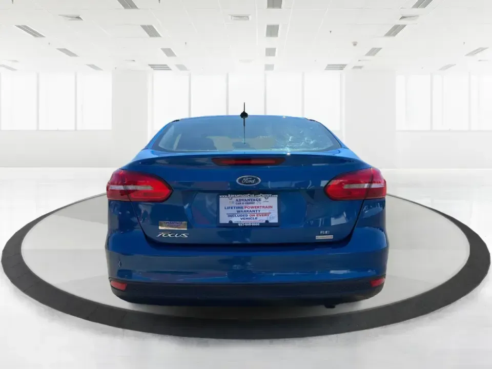 2018 Ford Focus SE (1FADP3FE5JL) with an 1.0L L3 engine, Automatic transmission, located at 1230 East Main St, Xenia, OH, 45385, (937) 908-9800, 39.688026, -83.910172 - Need a smart, budget-friendly commuter that's easy to live with all week and still ready for a spontaneous weekend escape? This 2018 Ford Focus SE sedan in eye-catching Lightning Blue Metallic is a practical pick for daily drives to Dayton, school drop-offs, and quick errands around Xenia-while keep - Photo#3