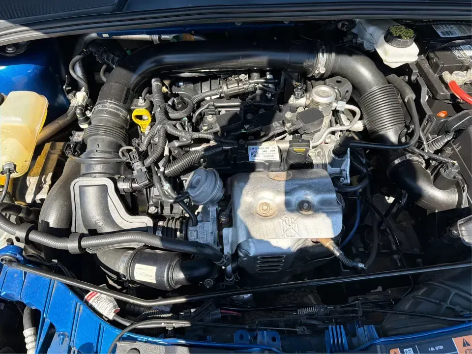 2018 Ford Focus SE (1FADP3FE5JL) with an 1.0L L3 engine, Automatic transmission, located at 1230 East Main St, Xenia, OH, 45385, (937) 908-9800, 39.688026, -83.910172 - Need a smart, budget-friendly commuter that's easy to live with all week and still ready for a spontaneous weekend escape? This 2018 Ford Focus SE sedan in eye-catching Lightning Blue Metallic is a practical pick for daily drives to Dayton, school drop-offs, and quick errands around Xenia-while keep - Photo#11