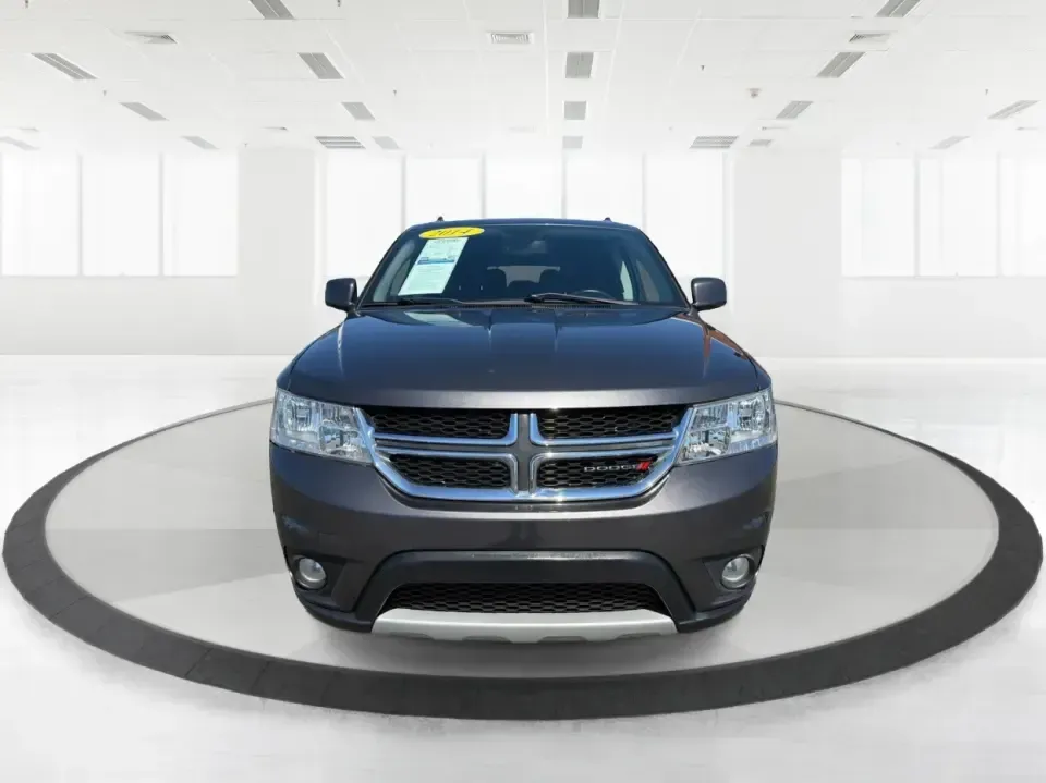 2014 Dodge Journey SXT (3C4PDDBG0ET) with an 3.6L V-6 DOHC engine, 6-Speed Automatic transmission, located at 1099 N County Rd 25A , Troy, OH, 45373, (937) 908-9800, 40.057079, -84.212883 - Pack up the kids, the dog, and the weekend bags-this 2014 Dodge Journey SXT is the kind of SUV that makes everyday life in Troy easier and spontaneous road trips feel completely doable. Whether you're tackling school drop-offs, commuting to Dayton, or planning a family day at the Miami County Fairgr - Photo#7