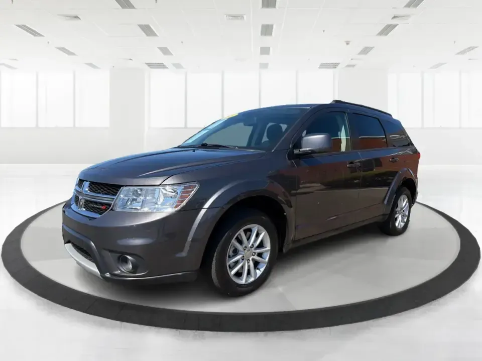 2014 Dodge Journey SXT (3C4PDDBG0ET) with an 3.6L V-6 DOHC engine, 6-Speed Automatic transmission, located at 1099 N County Rd 25A , Troy, OH, 45373, (937) 908-9800, 40.057079, -84.212883 - Pack up the kids, the dog, and the weekend bags-this 2014 Dodge Journey SXT is the kind of SUV that makes everyday life in Troy easier and spontaneous road trips feel completely doable. Whether you're tackling school drop-offs, commuting to Dayton, or planning a family day at the Miami County Fairgr - Photo#8