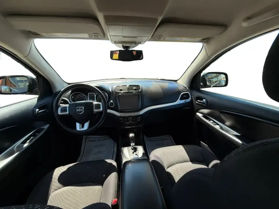 2014 Dodge Journey SXT (3C4PDDBG0ET) with an 3.6L V-6 DOHC engine, 6-Speed Automatic transmission, located at 1099 N County Rd 25A , Troy, OH, 45373, (937) 908-9800, 40.057079, -84.212883 - Pack up the kids, the dog, and the weekend bags-this 2014 Dodge Journey SXT is the kind of SUV that makes everyday life in Troy easier and spontaneous road trips feel completely doable. Whether you're tackling school drop-offs, commuting to Dayton, or planning a family day at the Miami County Fairgr - Photo#21