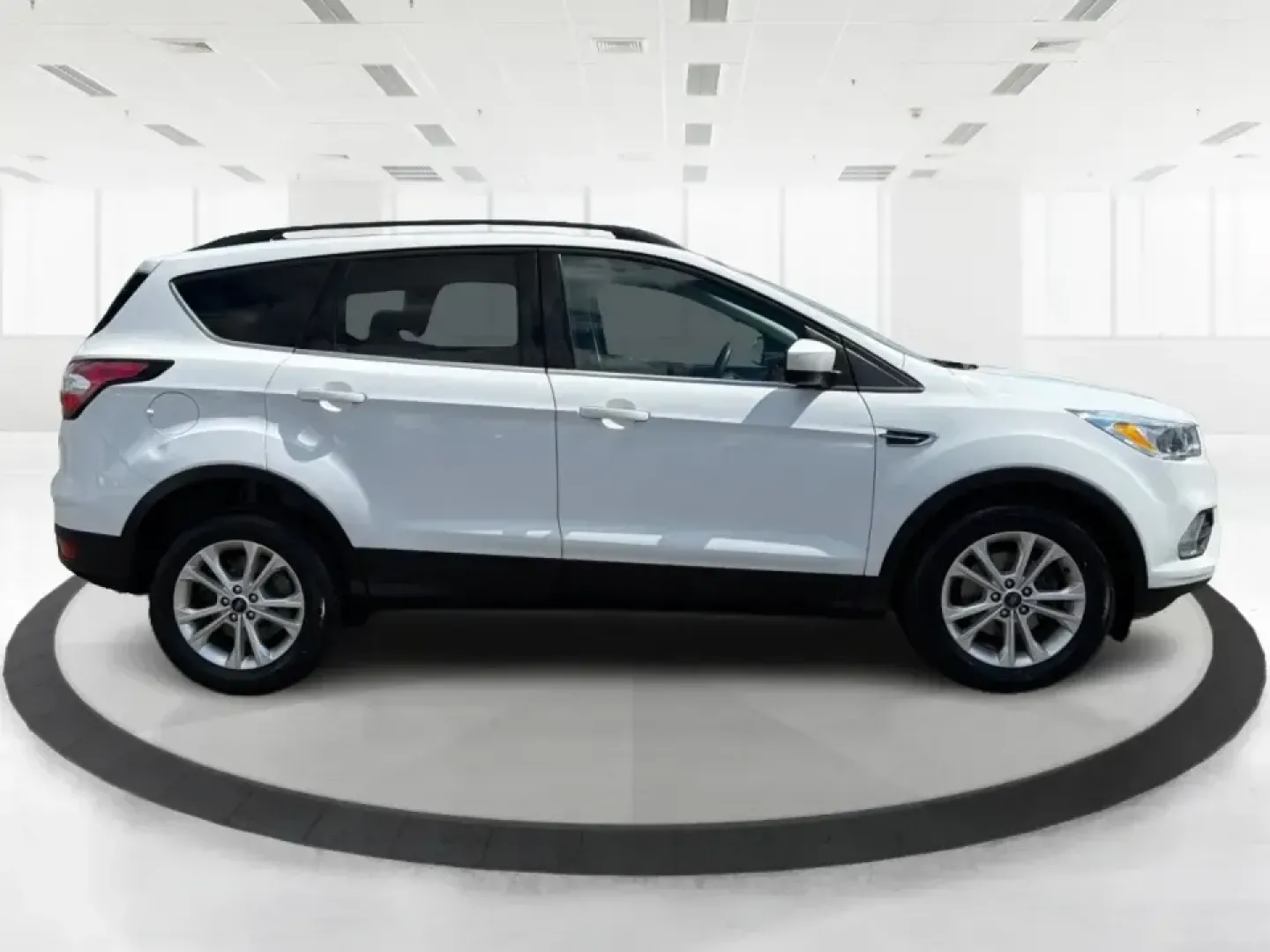 2018 Ford Escape SE (1FMCU0GD2JU) with an 1.5L L4 DOHC 16V engine, 6A transmission, located at 1951 S Dayton Lakeview Rd., New Carlisle, OH, 45344, (937) 908-9800, 39.890999, -84.050255 - Picture your next easy-to-live-with SUV: something that handles weekday commutes down I70, last-minute grocery runs near Brandt Pike, and weekend getaways to Buck Creek State Park without draining your budget. This 2018 Ford Escape SE is built for real life in Clark County-comfortable, efficient, an- Photo#1