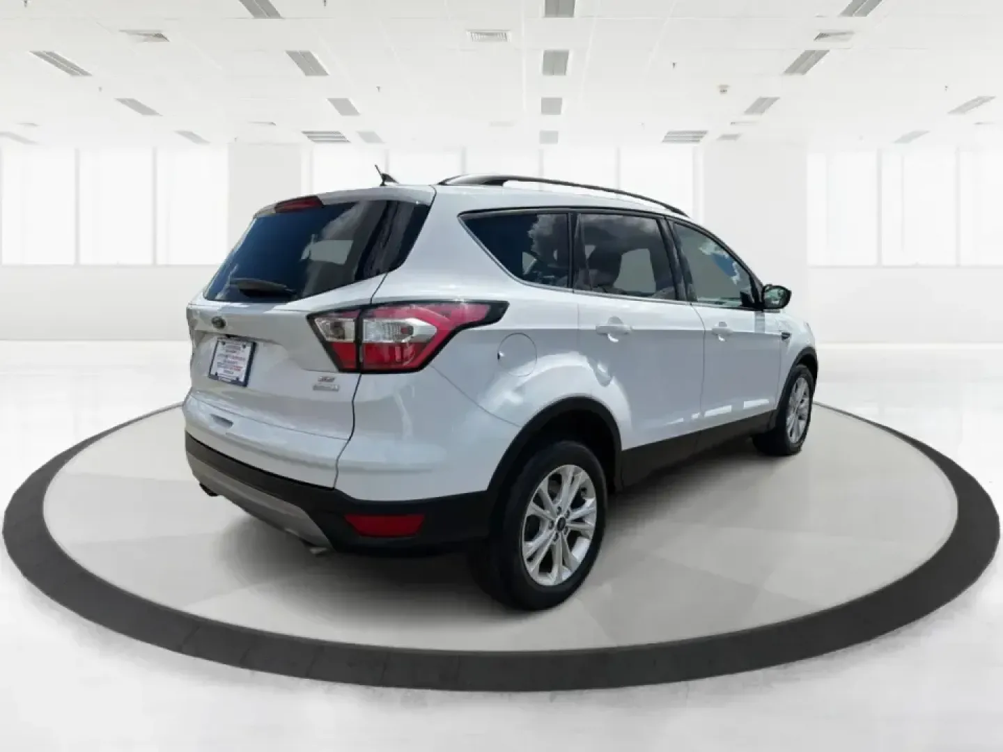 2018 Ford Escape SE (1FMCU0GD2JU) with an 1.5L L4 DOHC 16V engine, 6A transmission, located at 1951 S Dayton Lakeview Rd., New Carlisle, OH, 45344, (937) 908-9800, 39.890999, -84.050255 - Picture your next easy-to-live-with SUV: something that handles weekday commutes down I70, last-minute grocery runs near Brandt Pike, and weekend getaways to Buck Creek State Park without draining your budget. This 2018 Ford Escape SE is built for real life in Clark County-comfortable, efficient, an- Photo#2