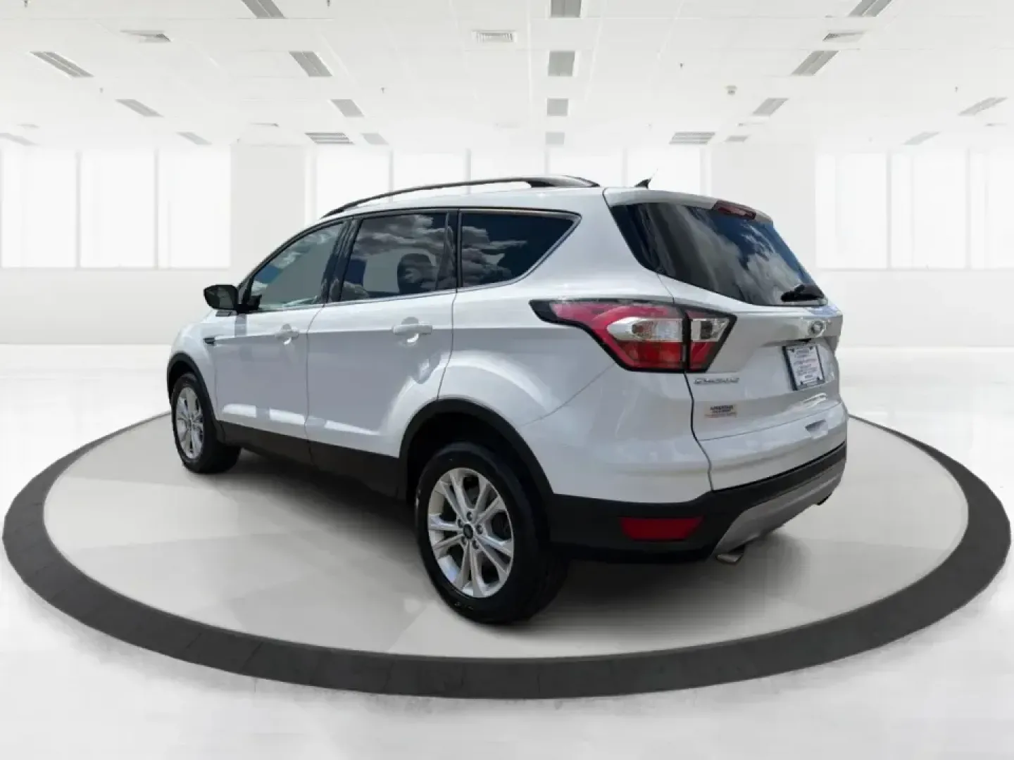 2018 Ford Escape SE (1FMCU0GD2JU) with an 1.5L L4 DOHC 16V engine, 6A transmission, located at 1951 S Dayton Lakeview Rd., New Carlisle, OH, 45344, (937) 908-9800, 39.890999, -84.050255 - Picture your next easy-to-live-with SUV: something that handles weekday commutes down I70, last-minute grocery runs near Brandt Pike, and weekend getaways to Buck Creek State Park without draining your budget. This 2018 Ford Escape SE is built for real life in Clark County-comfortable, efficient, an- Photo#4