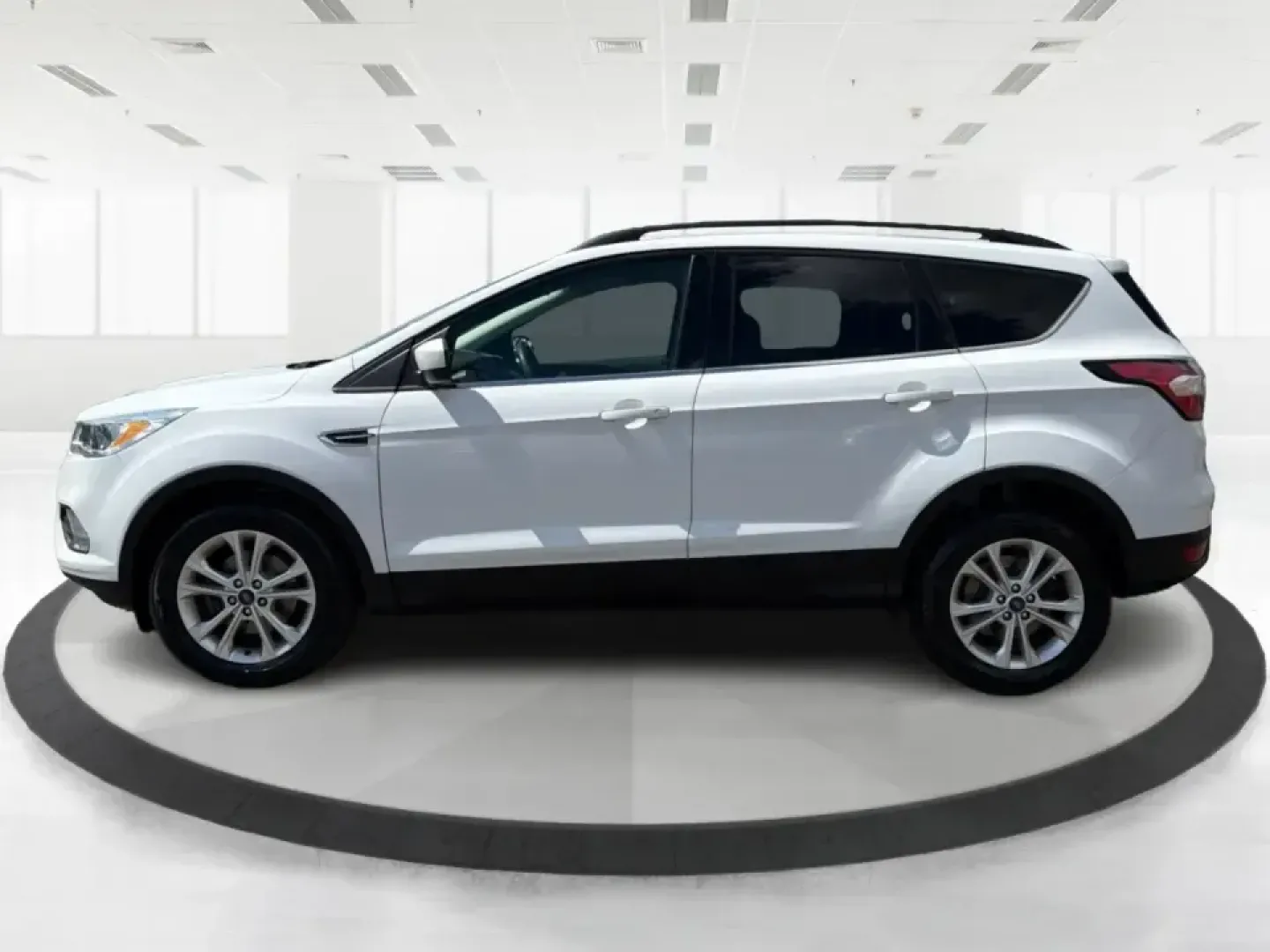 2018 Ford Escape SE (1FMCU0GD2JU) with an 1.5L L4 DOHC 16V engine, 6A transmission, located at 1951 S Dayton Lakeview Rd., New Carlisle, OH, 45344, (937) 908-9800, 39.890999, -84.050255 - Picture your next easy-to-live-with SUV: something that handles weekday commutes down I70, last-minute grocery runs near Brandt Pike, and weekend getaways to Buck Creek State Park without draining your budget. This 2018 Ford Escape SE is built for real life in Clark County-comfortable, efficient, an- Photo#5