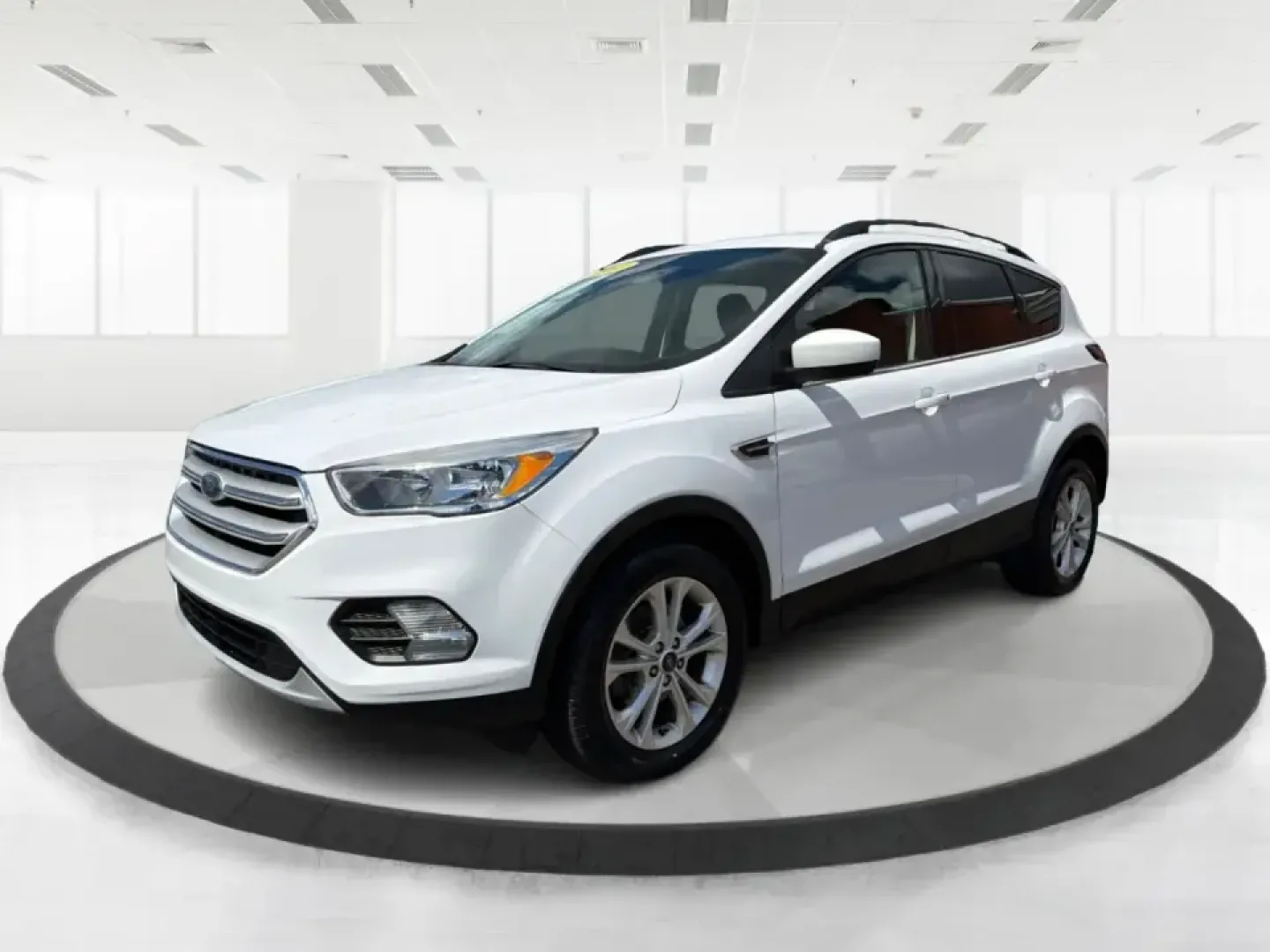 2018 Ford Escape SE (1FMCU0GD2JU) with an 1.5L L4 DOHC 16V engine, 6A transmission, located at 1951 S Dayton Lakeview Rd., New Carlisle, OH, 45344, (937) 908-9800, 39.890999, -84.050255 - Picture your next easy-to-live-with SUV: something that handles weekday commutes down I70, last-minute grocery runs near Brandt Pike, and weekend getaways to Buck Creek State Park without draining your budget. This 2018 Ford Escape SE is built for real life in Clark County-comfortable, efficient, an- Photo#8