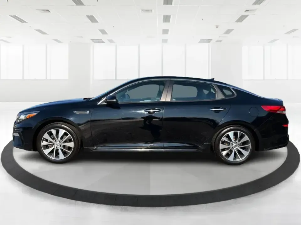 2019 Kia Optima S (5XXGT4L37KG) with an Theta II 2.4L I-4 gasoline direct injection engine, 6A transmission, located at 1099 N County Rd 25A , Troy, OH, 45373, (937) 908-9800, 40.057079, -84.212883 - Need a reliable commuter that still feels stylish for date night downtown, comfortable for weekend trips to Dayton, and efficient for the daily run up I75? This 2019 Kia Optima S in Ebony Black is a smart, budget-friendly sedan that fits real life-whether you're clocking a long work commute, shuttli - Photo#5