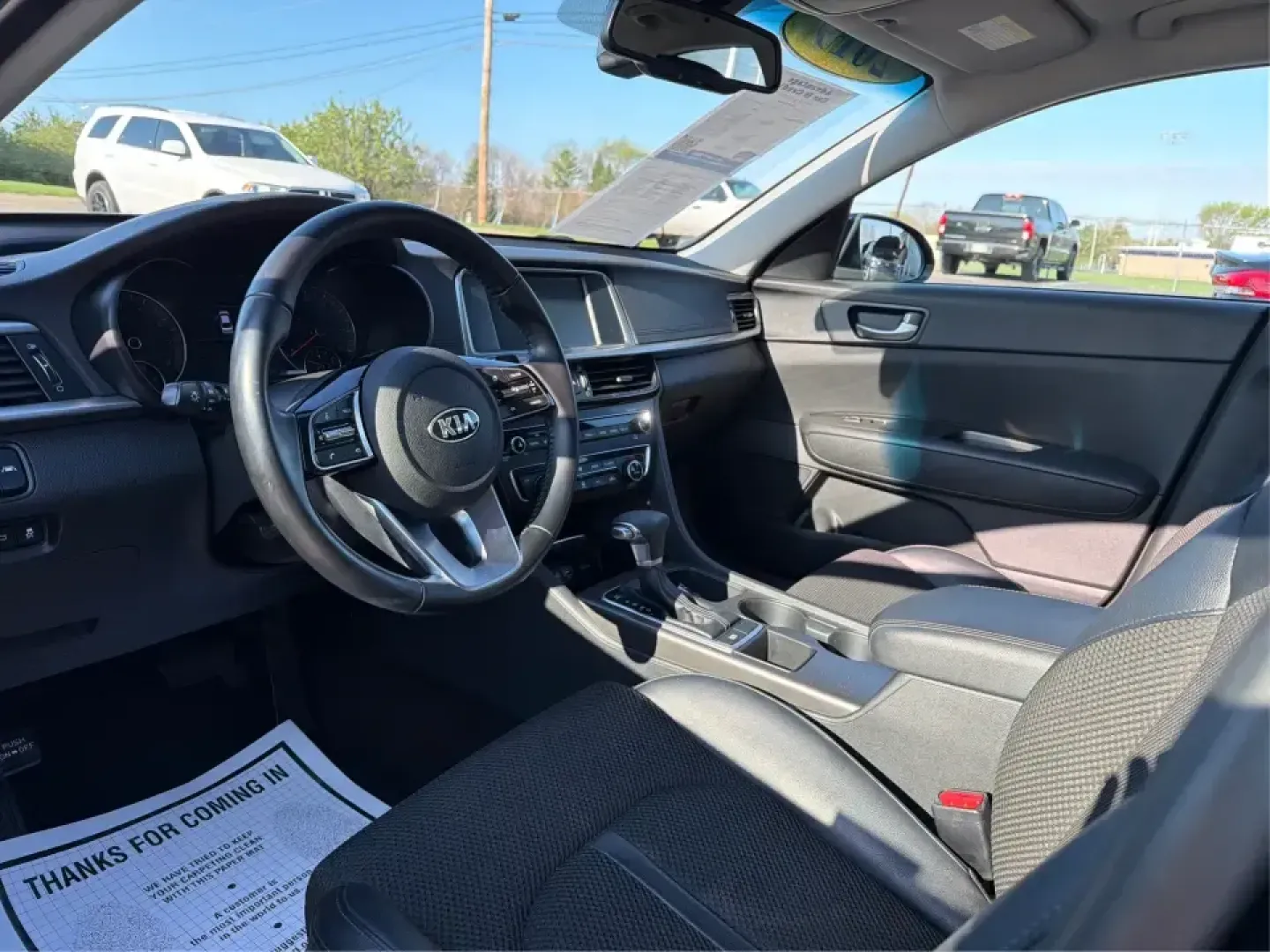 2019 Kia Optima S (5XXGT4L37KG) with an Theta II 2.4L I-4 gasoline direct injection engine, 6A transmission, located at 1099 N County Rd 25A , Troy, OH, 45373, (937) 908-9800, 40.057079, -84.212883 - Need a reliable commuter that still feels stylish for date night downtown, comfortable for weekend trips to Dayton, and efficient for the daily run up I75? This 2019 Kia Optima S in Ebony Black is a smart, budget-friendly sedan that fits real life-whether you're clocking a long work commute, shuttli - Photo#9