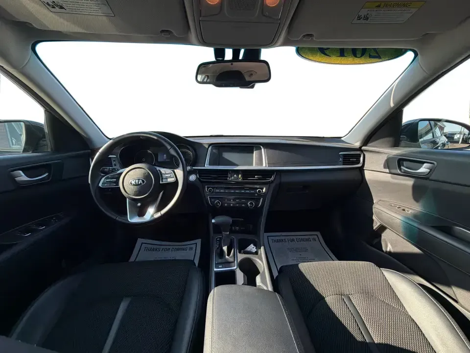 2019 Kia Optima S (5XXGT4L37KG) with an Theta II 2.4L I-4 gasoline direct injection engine, 6A transmission, located at 1099 N County Rd 25A , Troy, OH, 45373, (937) 908-9800, 40.057079, -84.212883 - Need a reliable commuter that still feels stylish for date night downtown, comfortable for weekend trips to Dayton, and efficient for the daily run up I75? This 2019 Kia Optima S in Ebony Black is a smart, budget-friendly sedan that fits real life-whether you're clocking a long work commute, shuttli - Photo#20