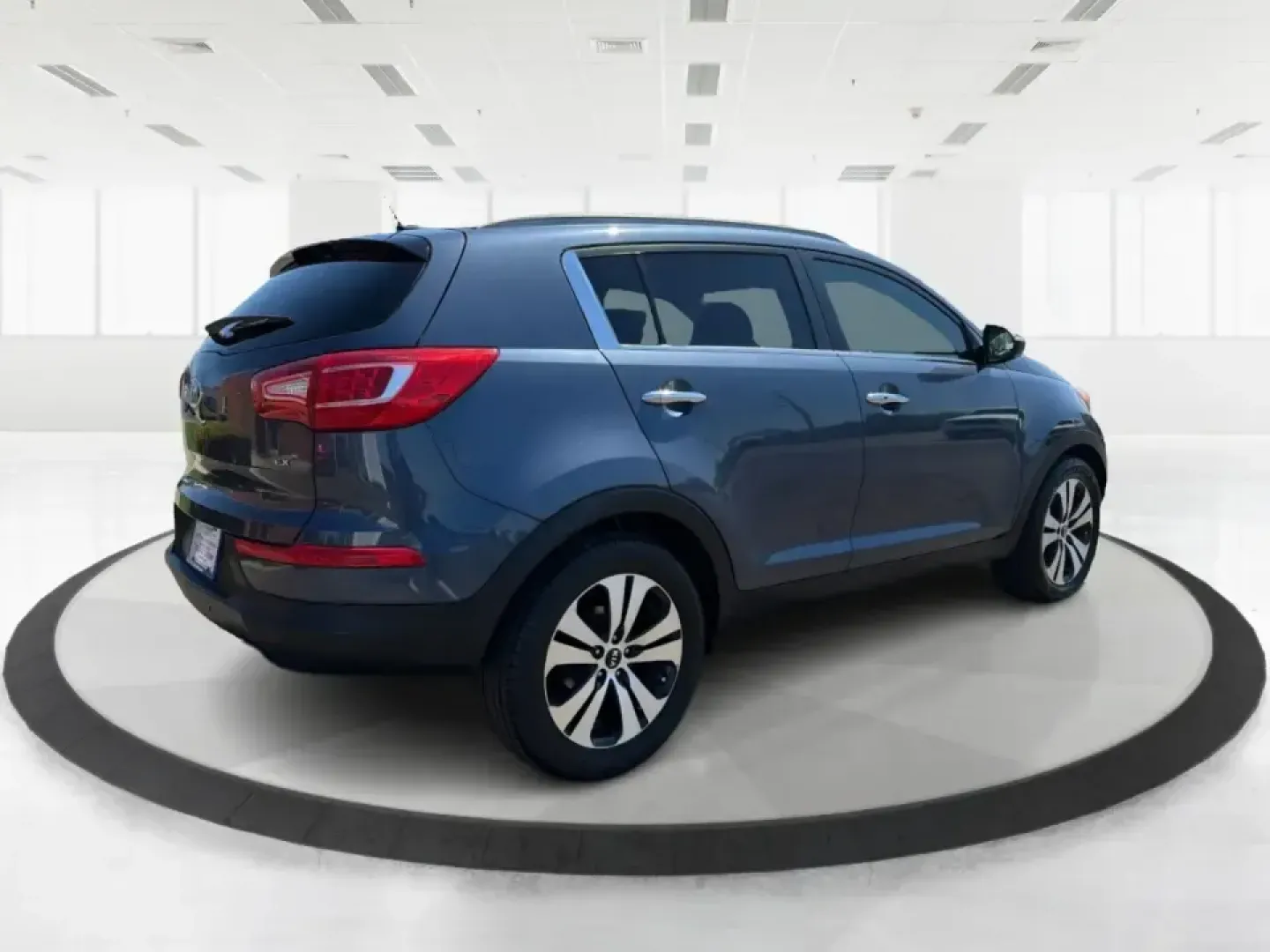 2012 Kia Sportage EX (KNDPC3A28C7) with an 2.4L I-4 DOHC engine, 6-Speed Automatic transmission, located at 880 E. National Road, Vandalia, OH, 45377, (937) 908-9800, 39.891918, -84.183594 - Picture your next week done right: an easy commute down I75, quick school drop-offs, a grocery run in the rain, and a spontaneous weekend trip to Taylorsville MetroPark-all in a compact SUV that feels comfortable, confident, and practical. This 2012 Kia Sportage EX in Twilight Blue is a smart fit fo - Photo#2