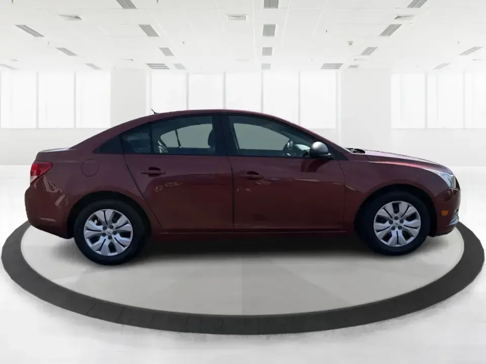 2013 Chevrolet Cruze LS Auto (1G1PA5SG2D7) with an 1.8L L4 DOHC 16V engine, 6-Speed Automatic transmission, located at 1099 N County Rd 25A , Troy, OH, 45373, (937) 908-9800, 40.057079, -84.212883 - Need a dependable commuter that sips fuel, fits five, and still feels comfortable for weekend errands and quick road trips? This **2013 Chevrolet Cruze LS Auto** is a smart pick for busy schedules in and around **Troy, Ohio**, whether you're heading down **I-75**, cruising **SR-55**, or making the d- Photo#1