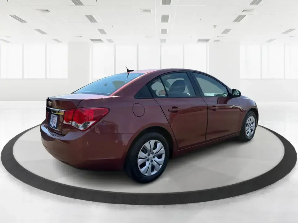2013 Chevrolet Cruze LS Auto (1G1PA5SG2D7) with an 1.8L L4 DOHC 16V engine, 6-Speed Automatic transmission, located at 1099 N County Rd 25A , Troy, OH, 45373, (937) 908-9800, 40.057079, -84.212883 - Need a dependable commuter that sips fuel, fits five, and still feels comfortable for weekend errands and quick road trips? This **2013 Chevrolet Cruze LS Auto** is a smart pick for busy schedules in and around **Troy, Ohio**, whether you're heading down **I-75**, cruising **SR-55**, or making the d- Photo#2