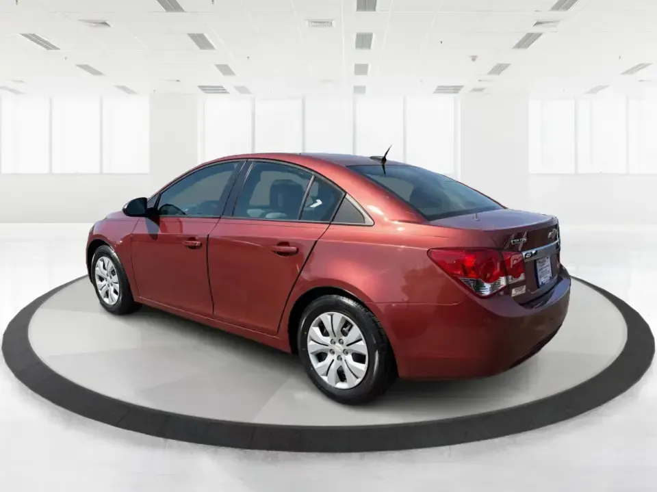 2013 Chevrolet Cruze LS Auto (1G1PA5SG2D7) with an 1.8L L4 DOHC 16V engine, 6-Speed Automatic transmission, located at 1099 N County Rd 25A , Troy, OH, 45373, (937) 908-9800, 40.057079, -84.212883 - Need a dependable commuter that sips fuel, fits five, and still feels comfortable for weekend errands and quick road trips? This **2013 Chevrolet Cruze LS Auto** is a smart pick for busy schedules in and around **Troy, Ohio**, whether you're heading down **I-75**, cruising **SR-55**, or making the d- Photo#4