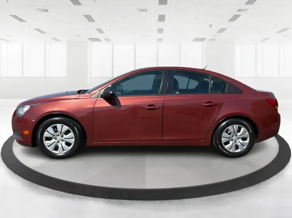 2013 Chevrolet Cruze LS Auto (1G1PA5SG2D7) with an 1.8L L4 DOHC 16V engine, 6-Speed Automatic transmission, located at 1099 N County Rd 25A , Troy, OH, 45373, (937) 908-9800, 40.057079, -84.212883 - Need a dependable commuter that sips fuel, fits five, and still feels comfortable for weekend errands and quick road trips? This **2013 Chevrolet Cruze LS Auto** is a smart pick for busy schedules in and around **Troy, Ohio**, whether you're heading down **I-75**, cruising **SR-55**, or making the d- Photo#5