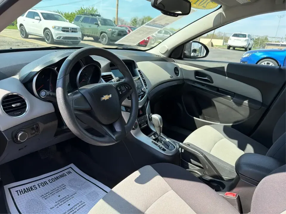 2013 Chevrolet Cruze LS Auto (1G1PA5SG2D7) with an 1.8L L4 DOHC 16V engine, 6-Speed Automatic transmission, located at 1099 N County Rd 25A , Troy, OH, 45373, (937) 908-9800, 40.057079, -84.212883 - Need a dependable commuter that sips fuel, fits five, and still feels comfortable for weekend errands and quick road trips? This **2013 Chevrolet Cruze LS Auto** is a smart pick for busy schedules in and around **Troy, Ohio**, whether you're heading down **I-75**, cruising **SR-55**, or making the d- Photo#9