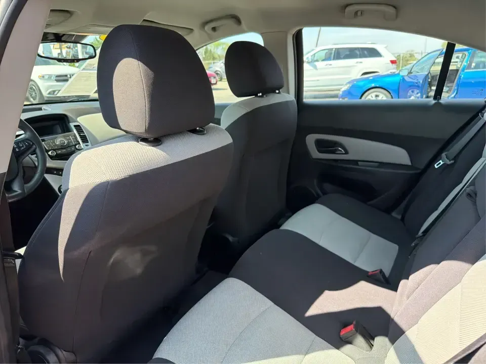 2013 Chevrolet Cruze LS Auto (1G1PA5SG2D7) with an 1.8L L4 DOHC 16V engine, 6-Speed Automatic transmission, located at 1099 N County Rd 25A , Troy, OH, 45373, (937) 908-9800, 40.057079, -84.212883 - Need a dependable commuter that sips fuel, fits five, and still feels comfortable for weekend errands and quick road trips? This **2013 Chevrolet Cruze LS Auto** is a smart pick for busy schedules in and around **Troy, Ohio**, whether you're heading down **I-75**, cruising **SR-55**, or making the d- Photo#10