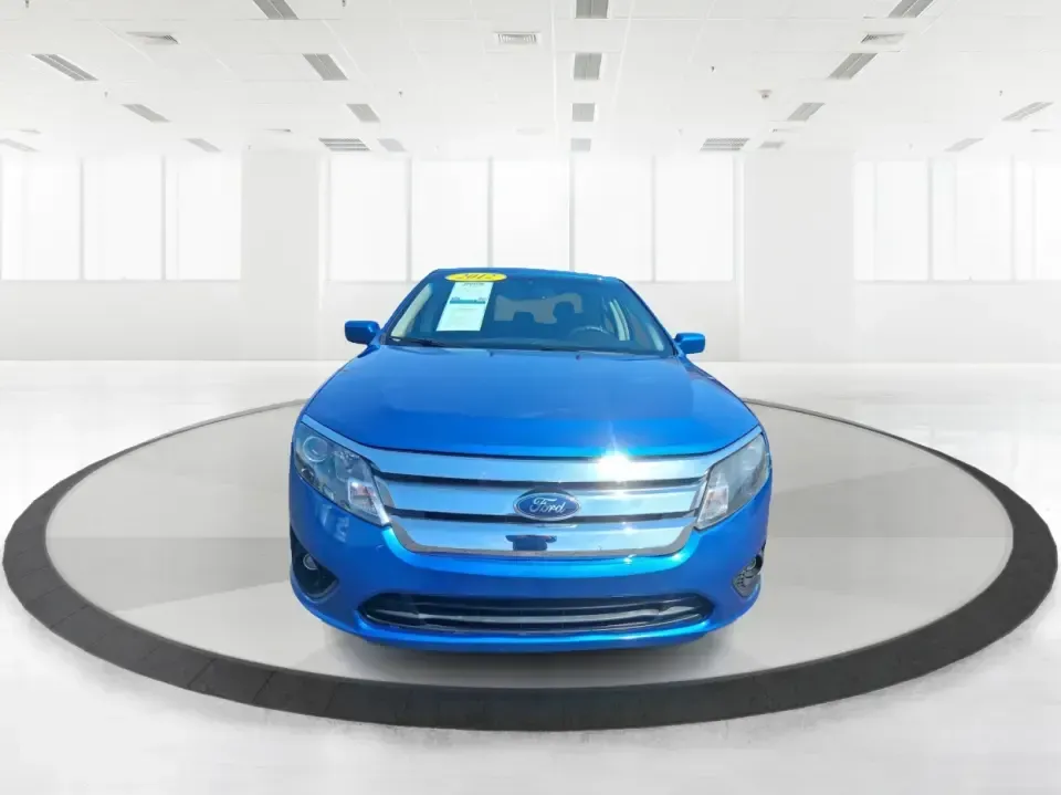 2012 Ford Fusion SE (3FAHP0HAXCR) with an 2.5L L4 DOHC 16V engine, located at 1230 East Main St, Xenia, OH, 45385, (937) 908-9800, 39.688026, -83.910172 - Need a dependable sedan that makes everyday life easier-whether you're commuting down I-75 to Dayton, running errands around Troy, or planning a weekend drive past the Miami River and downtown's shops and festivals? This 2012 Ford Fusion SE in Blue Flame Metallic is a smart, comfortable choice for b - Photo#7