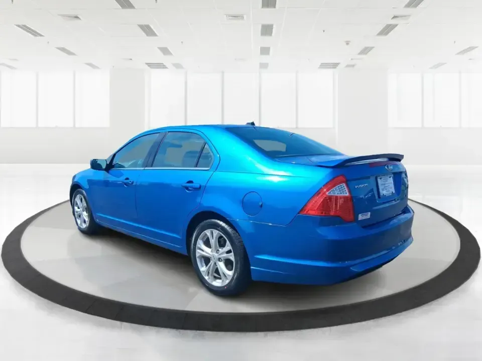 2012 Ford Fusion SE (3FAHP0HAXCR) with an 2.5L L4 DOHC 16V engine, located at 8750 N County Rd 25A, Piqua, OH, 45356, (937) 908-9800, 40.164391, -84.232513 - Need a dependable sedan that makes everyday life easier-whether you're commuting down I-75 to Dayton, running errands around Troy, or planning a weekend drive past the Miami River and downtown's shops and festivals? This 2012 Ford Fusion SE in Blue Flame Metallic is a smart, comfortable choice for b - Photo#4