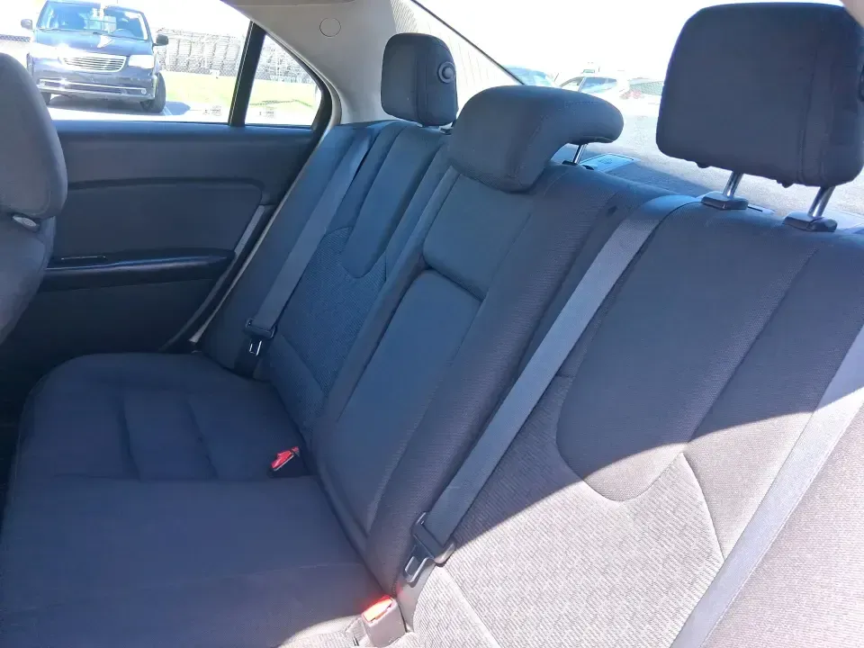 2012 Ford Fusion SE (3FAHP0HAXCR) with an 2.5L L4 DOHC 16V engine, located at 8750 N County Rd 25A, Piqua, OH, 45356, (937) 908-9800, 40.164391, -84.232513 - Need a dependable sedan that makes everyday life easier-whether you're commuting down I-75 to Dayton, running errands around Troy, or planning a weekend drive past the Miami River and downtown's shops and festivals? This 2012 Ford Fusion SE in Blue Flame Metallic is a smart, comfortable choice for b - Photo#10