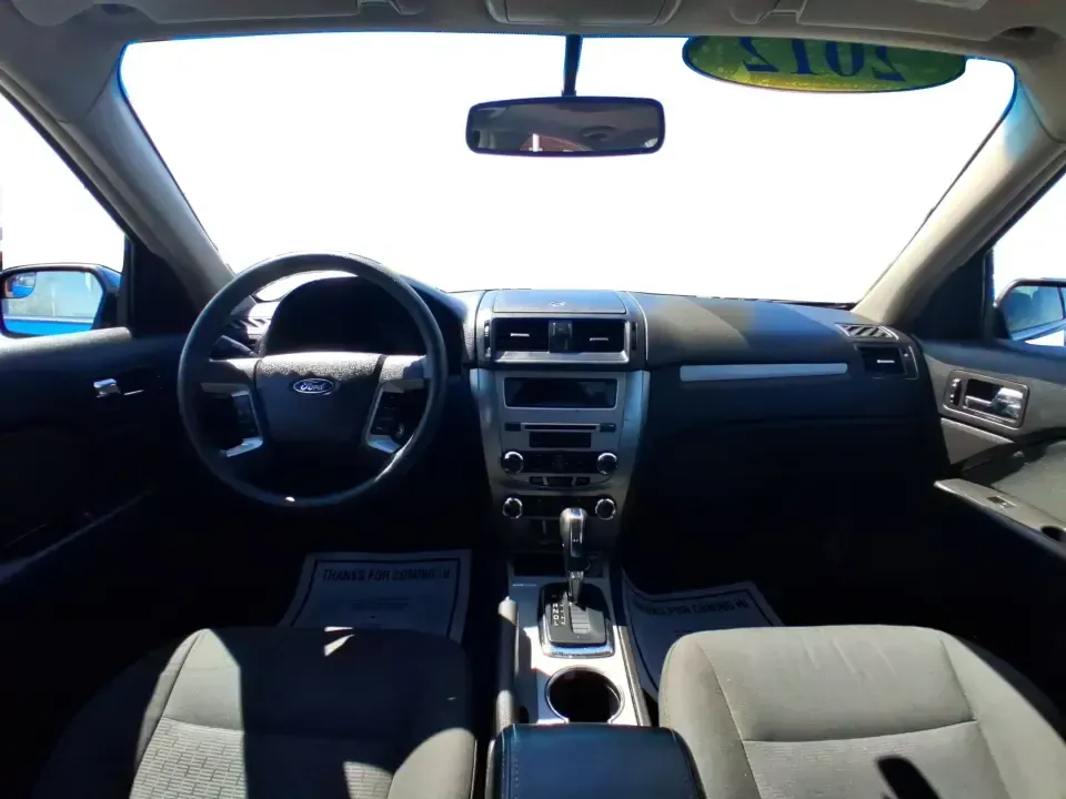 2012 Ford Fusion SE (3FAHP0HAXCR) with an 2.5L L4 DOHC 16V engine, located at 8750 N County Rd 25A, Piqua, OH, 45356, (937) 908-9800, 40.164391, -84.232513 - Need a dependable sedan that makes everyday life easier-whether you're commuting down I-75 to Dayton, running errands around Troy, or planning a weekend drive past the Miami River and downtown's shops and festivals? This 2012 Ford Fusion SE in Blue Flame Metallic is a smart, comfortable choice for b - Photo#21