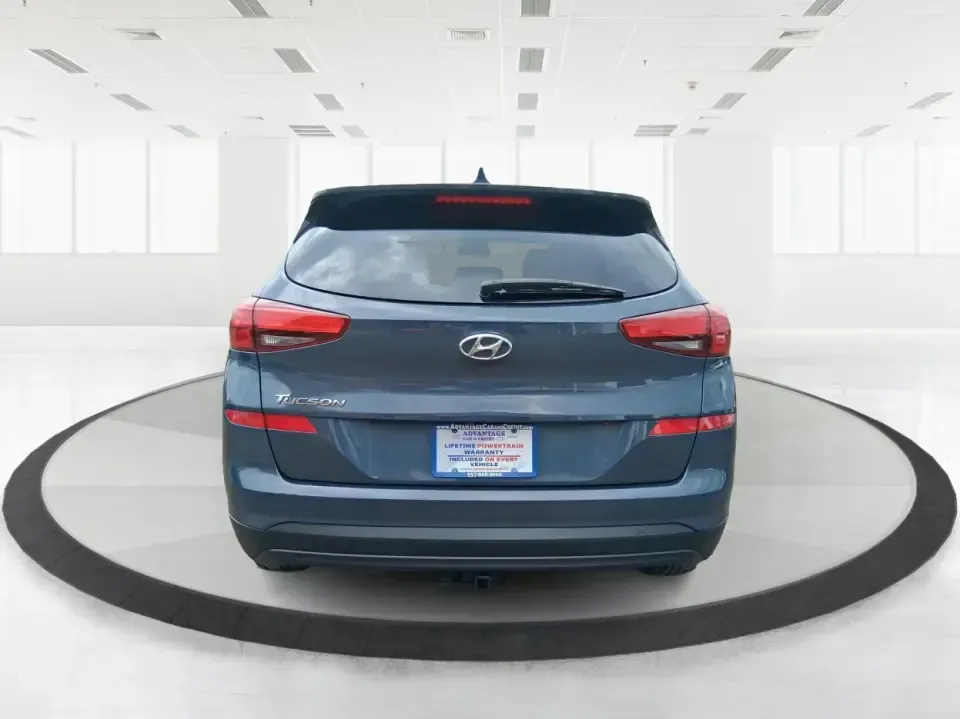 2019 Hyundai Tucson SE (KM8J23A41KU) with an Nu 2L I-4 gasoline direct injection engine, 6A transmission, located at 8750 N County Rd 25A, Piqua, OH, 45356, (937) 908-9800, 40.164391, -84.232513 - Need a practical SUV that can handle the daily school run, a long commute up I75, and weekend trips to the Miami Valley without draining your budget? This 2019 Hyundai Tucson SE in eye-catching Dusk Blue is built for real life in Piqua, Ohio-easy to park, comfortable for passengers, and ready for ev - Photo#3