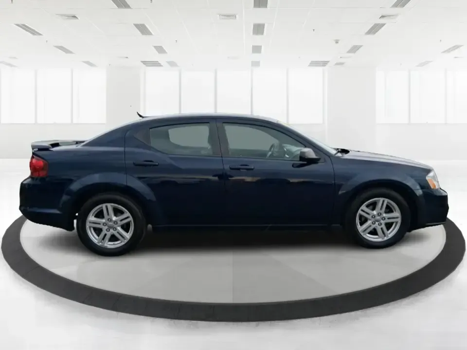 2014 Dodge Avenger SE (1C3CDZAG6EN) with an 3.6L V6 DOHC 24V FFV engine, 6-Speed Automatic transmission, located at 880 E. National Road, Vandalia, OH, 45377, (937) 908-9800, 39.891918, -84.183594 - Need a dependable commuter that still feels fun on I75, roomy enough for family errands, and confident for weekend drives to the National Museum of the U.S. Air Force? This 2014 Dodge Avenger SE in eye-catching True Blue Pearlcoat delivers the kind of real-world versatility Vandalia drivers want-com - Photo#1