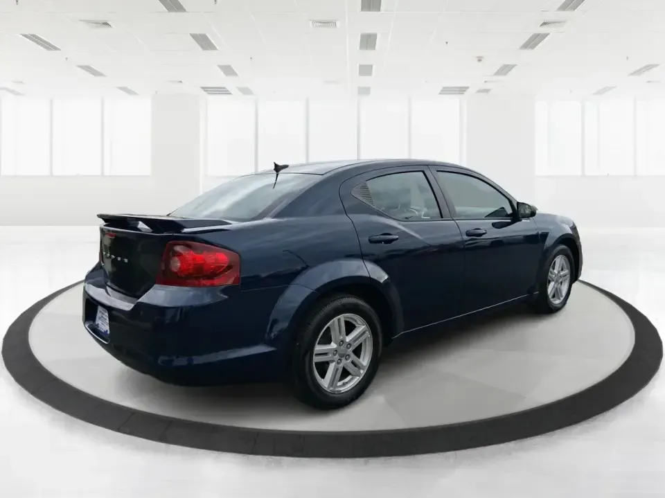2014 Dodge Avenger SE (1C3CDZAG6EN) with an 3.6L V6 DOHC 24V FFV engine, 6-Speed Automatic transmission, located at 880 E. National Road, Vandalia, OH, 45377, (937) 908-9800, 39.891918, -84.183594 - Need a dependable commuter that still feels fun on I75, roomy enough for family errands, and confident for weekend drives to the National Museum of the U.S. Air Force? This 2014 Dodge Avenger SE in eye-catching True Blue Pearlcoat delivers the kind of real-world versatility Vandalia drivers want-com - Photo#2