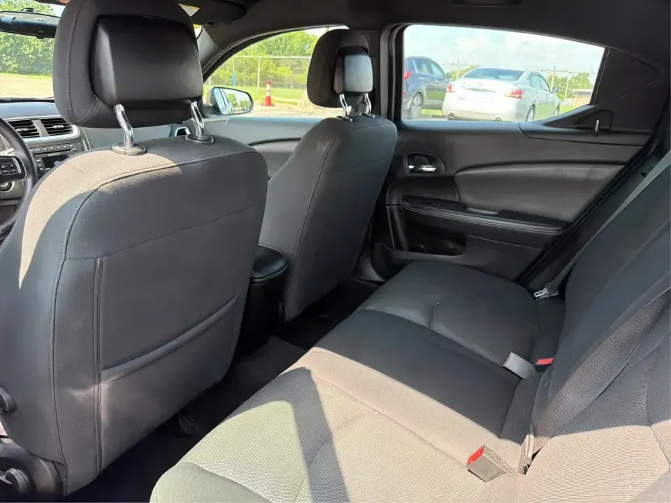 2014 Dodge Avenger SE (1C3CDZAG6EN) with an 3.6L V6 DOHC 24V FFV engine, 6-Speed Automatic transmission, located at 401 Woodman Dr, Riverside, OH, 45431, (937) 908-9800, 39.760899, -84.123421 - Need a comfortable, budget-friendly sedan that can handle the daily grind from Riverside to Downtown Dayton, quick school drop-offs, and the occasional weekend escape to Carillon Historical Park or a lap around the National Museum of the U.S. Air Force? This 2014 Dodge Avenger SE in eye-catching Tru- Photo#10