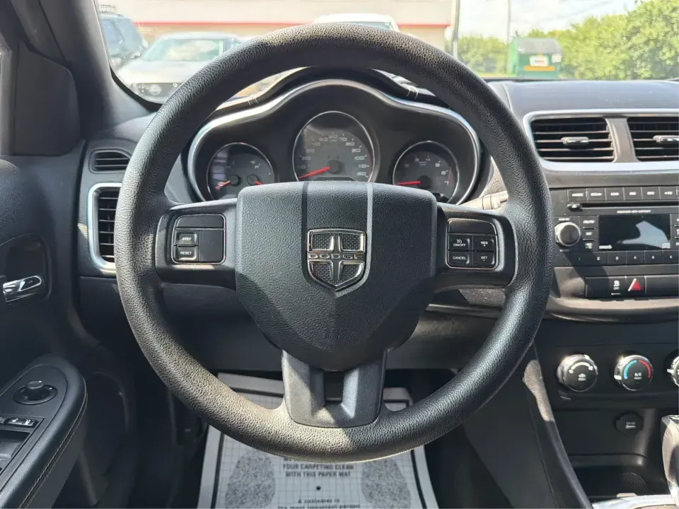 2014 Dodge Avenger SE (1C3CDZAG6EN) with an 3.6L V6 DOHC 24V FFV engine, 6-Speed Automatic transmission, located at 401 Woodman Dr, Riverside, OH, 45431, (937) 908-9800, 39.760899, -84.123421 - Need a comfortable, budget-friendly sedan that can handle the daily grind from Riverside to Downtown Dayton, quick school drop-offs, and the occasional weekend escape to Carillon Historical Park or a lap around the National Museum of the U.S. Air Force? This 2014 Dodge Avenger SE in eye-catching Tru- Photo#16