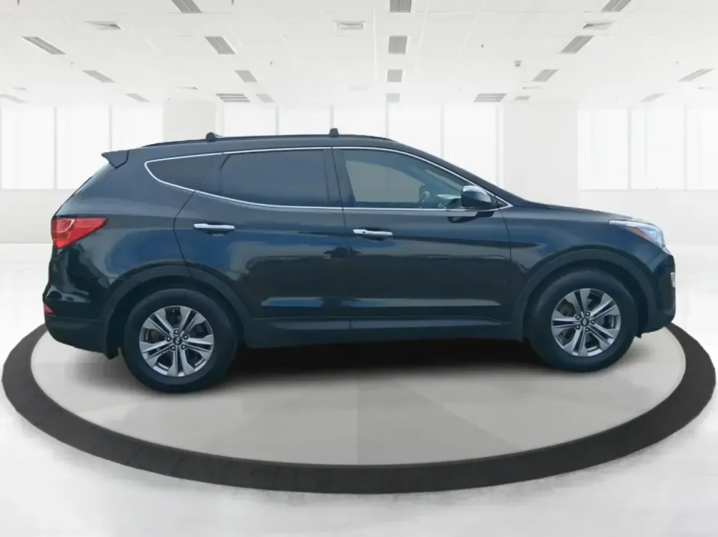 2015 Hyundai Santa Fe Sport 2.4 FWD (5XYZU3LB1FG) with an 2.4L L4 DOHC 16V engine, 6-Speed Automatic transmission, located at 1099 N County Rd 25A , Troy, OH, 45373, (937) 908-9800, 40.057079, -84.212883 - Picture your next road trip out of Troy: the kids buckled in, luggage packed, and plenty of comfort for I75 runs to Dayton or weekend getaways near the Miami River-without feeling like you're stretching your budget. This 2015 Hyundai Santa Fe 2.4L in Twilight Black is the kind of practical, do-it-al- Photo#1